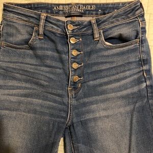 Button fly skinny jeans